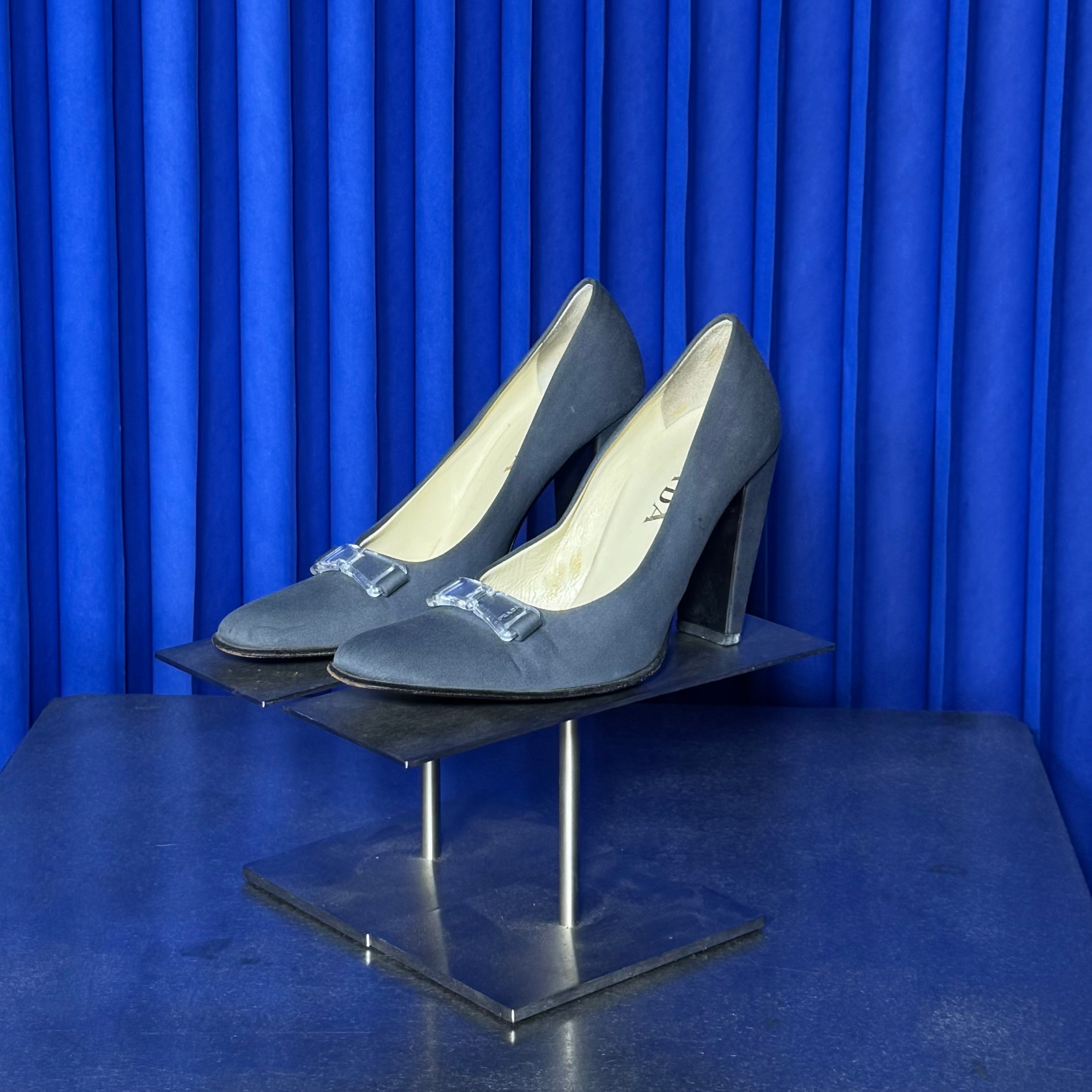 PRADA ACRYLIC BUCKLe PUMPS