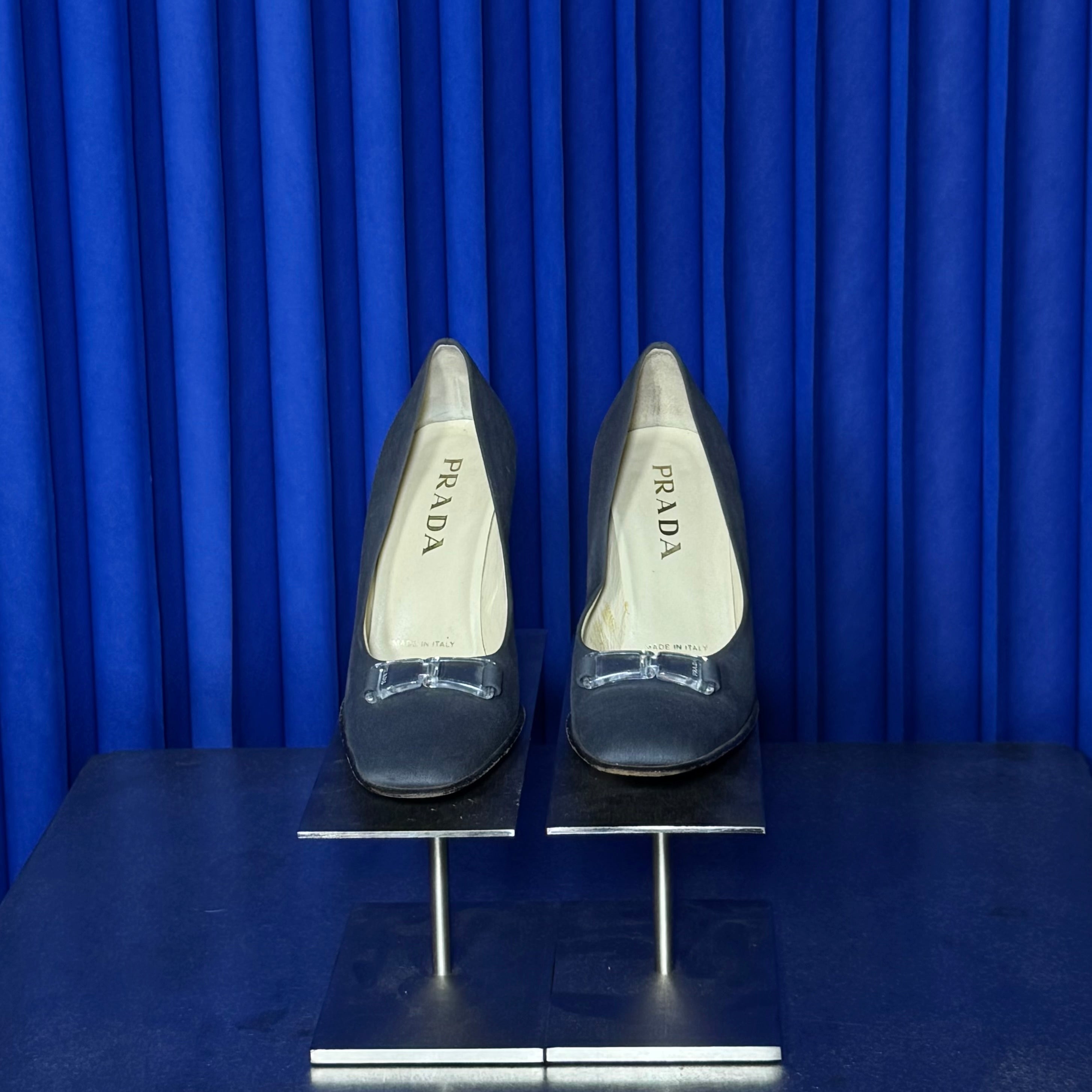 PRADA ACRYLIC BUCKLe PUMPS